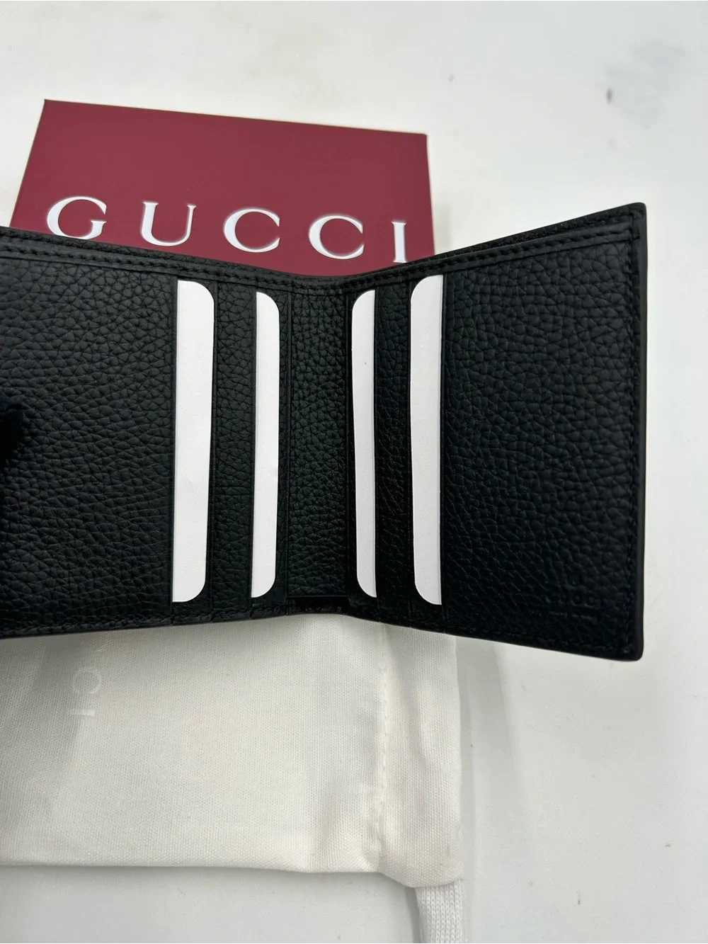 Men's Gucci jumbo GG Leather bifold wallet made in Italy